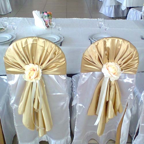 украшение стульев на свадьбу